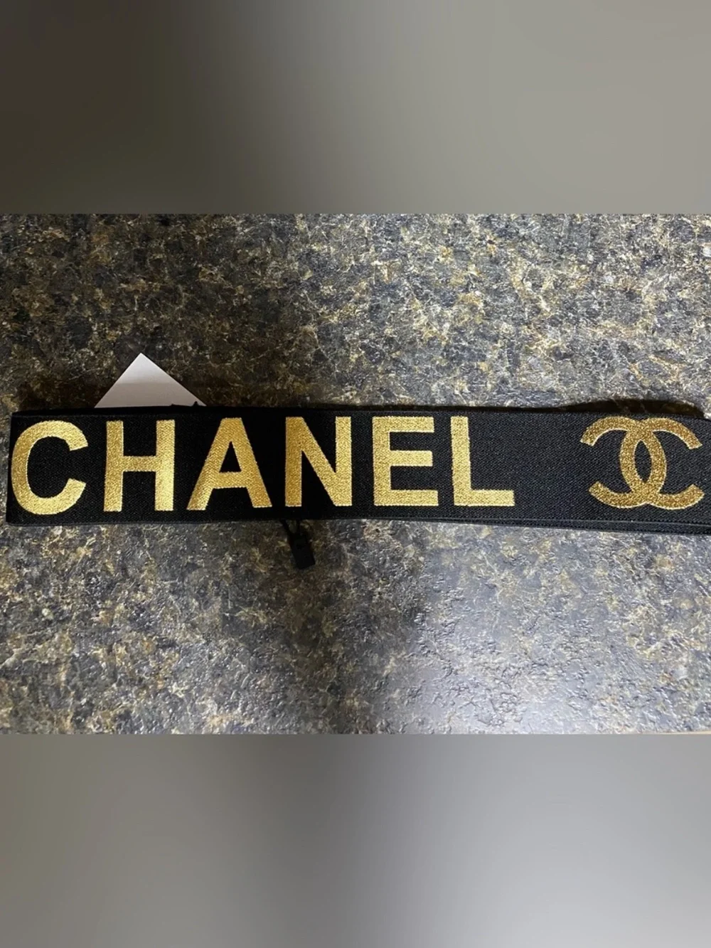 ChaneI Black Metallic Gold Stretch Spellout Headband